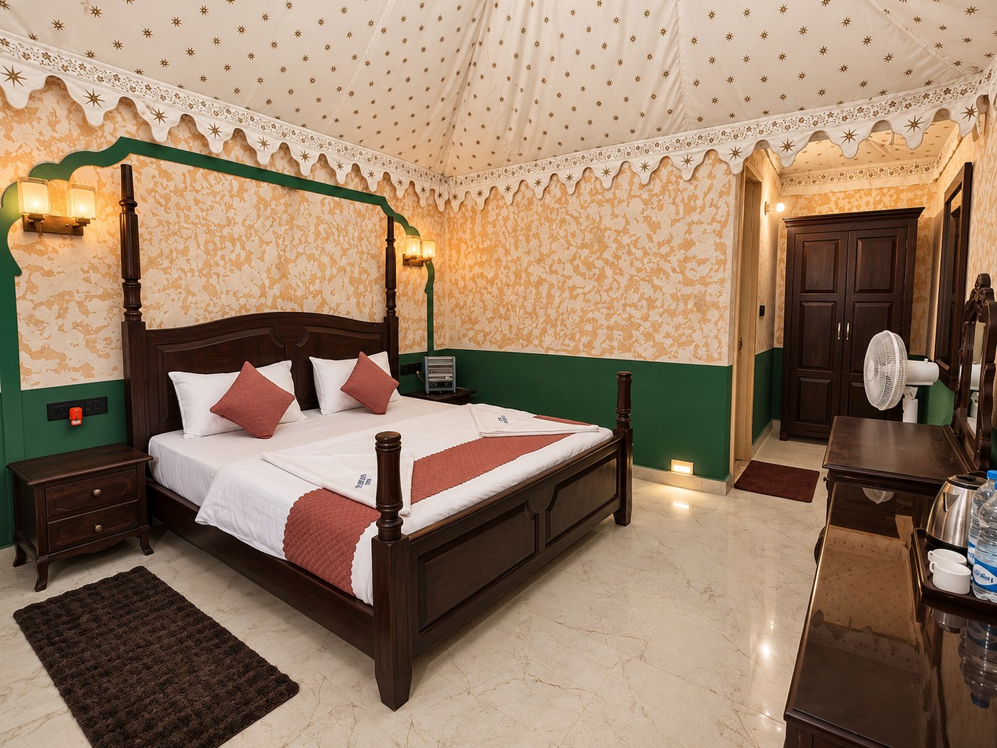 The Desert Cottage with four-poster bed and green dado walls
