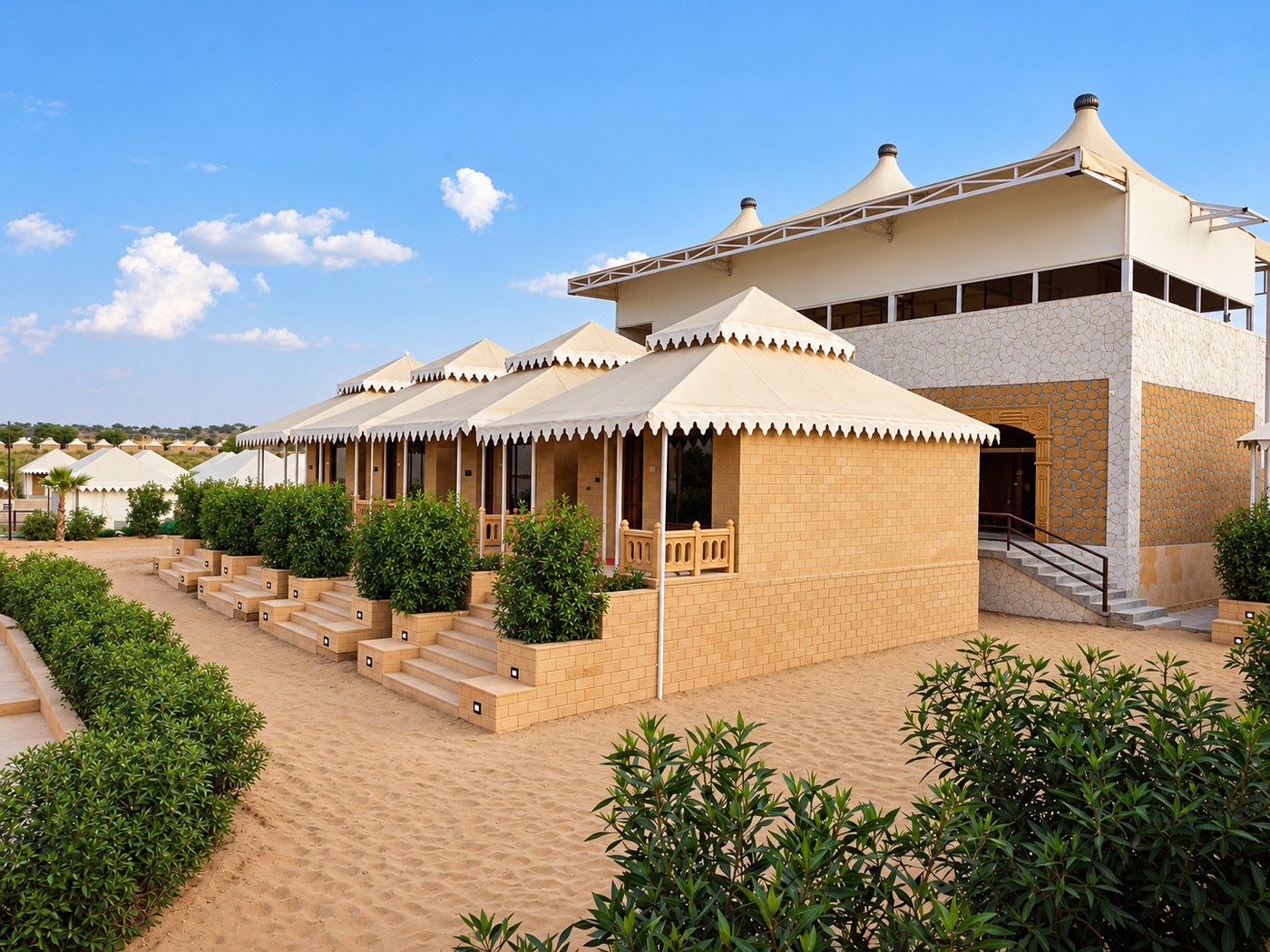 Cottages and the main building on the sand