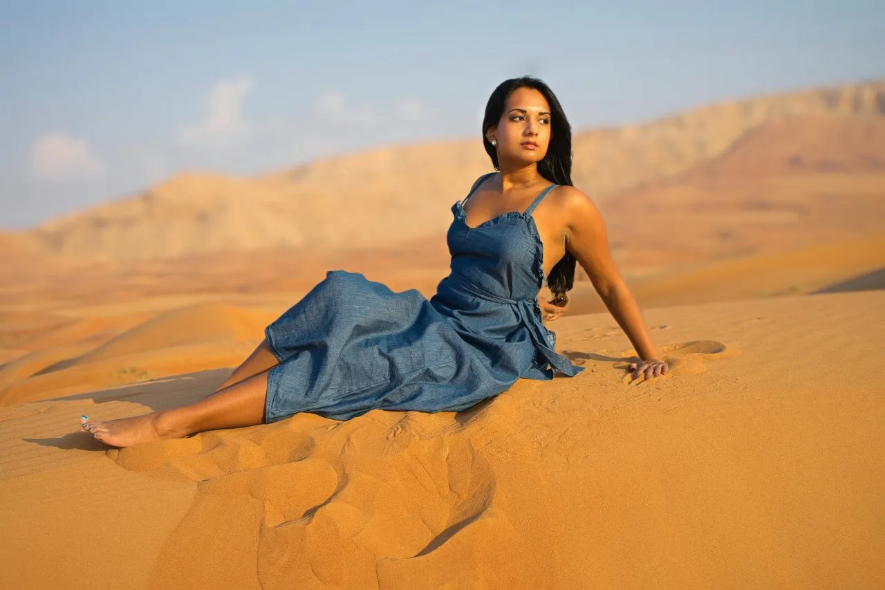 Guest relaxing on golden sand dunes